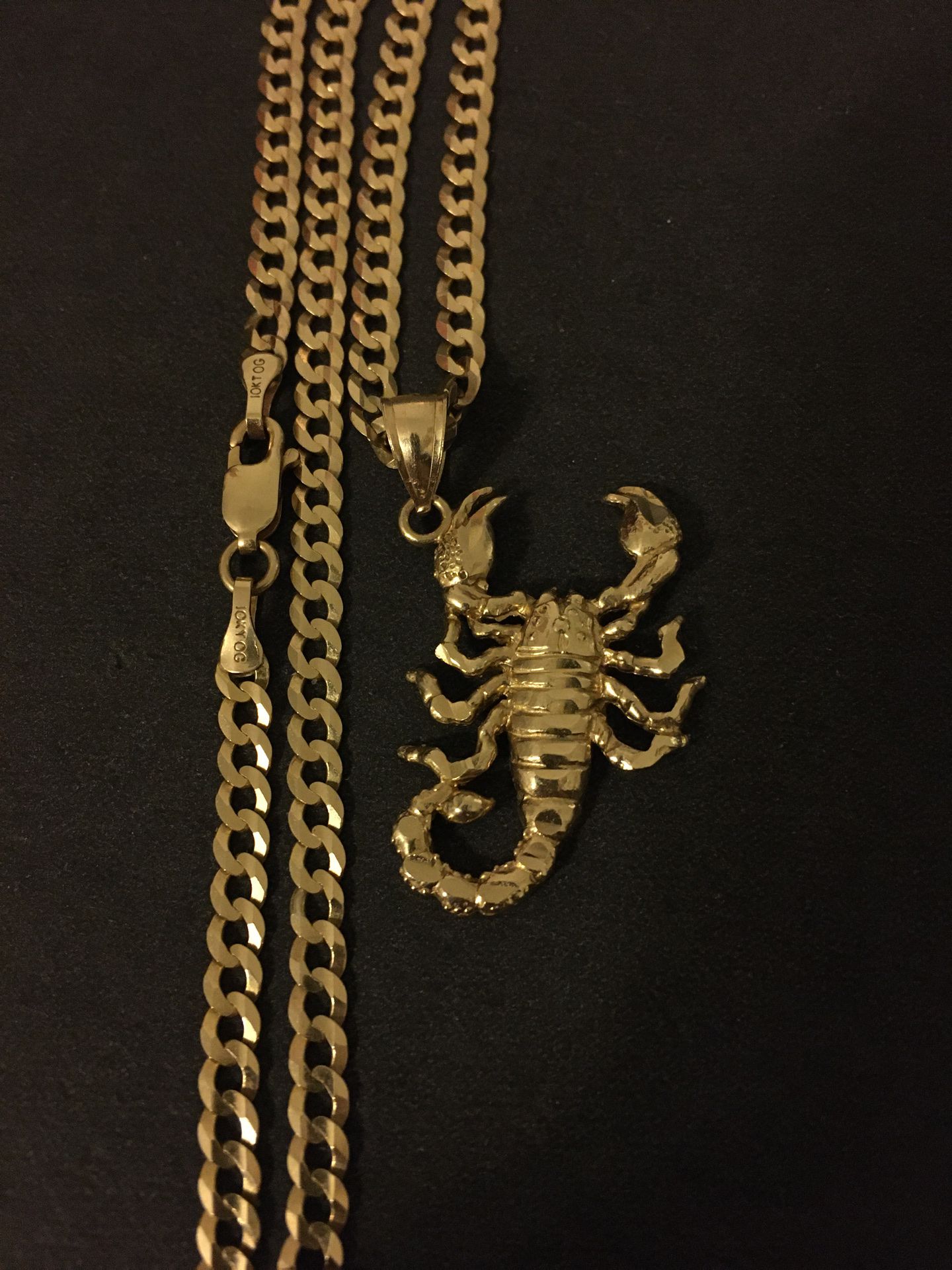 10k gold Cuban link Chan and scorpion pendant