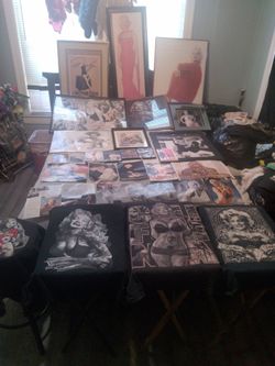 Marilyn Monroe Collection of Framed Pictures, Posters, and Tshirts and Magazines Pictures and Puzzle Framed Pictures and All her Movies on DVDS and al