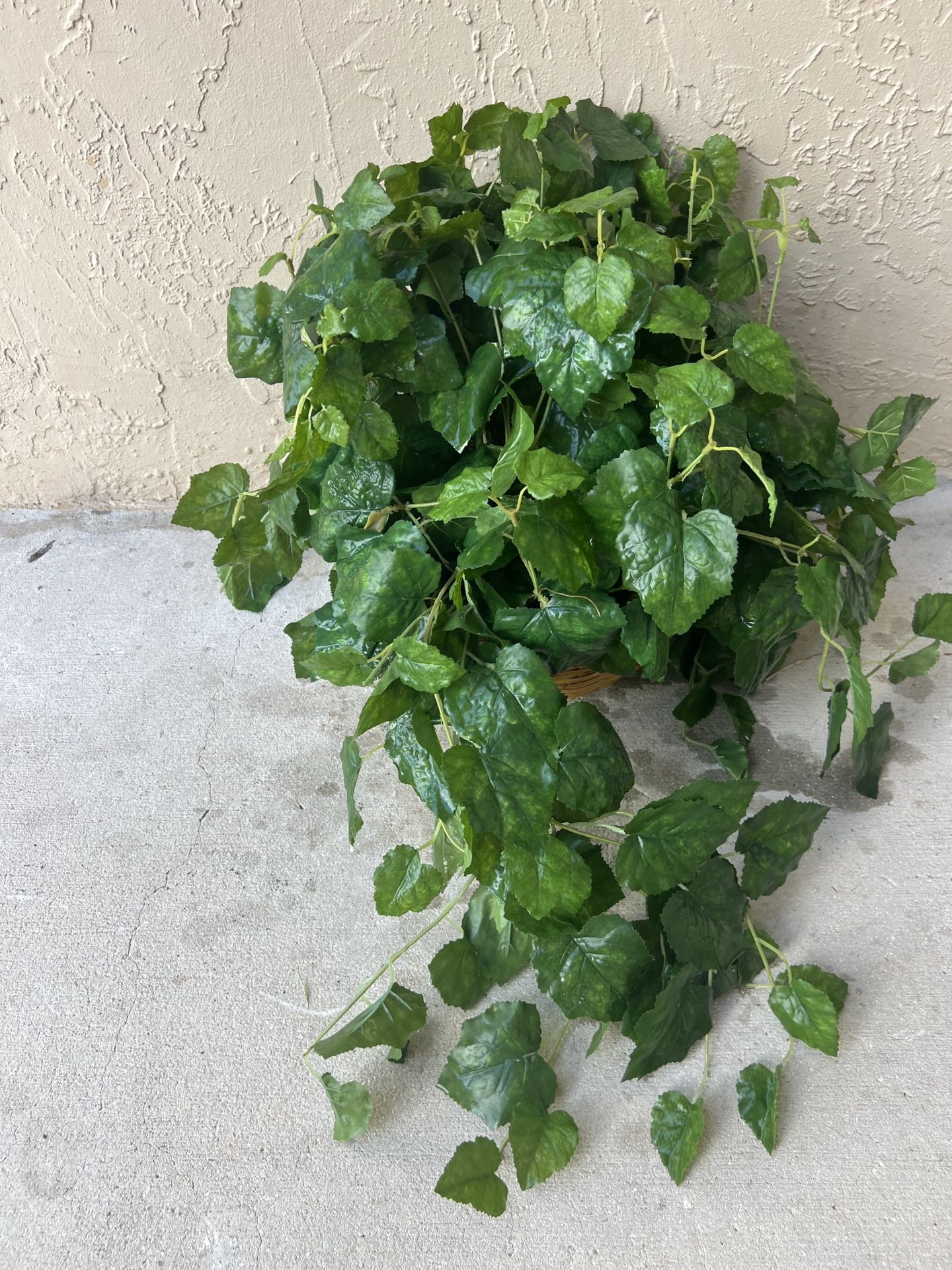 basket with artificial plant