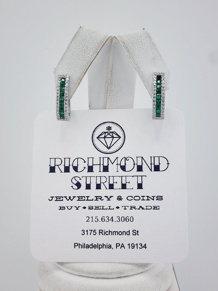 18k gold emerald and VS diamond earrings 