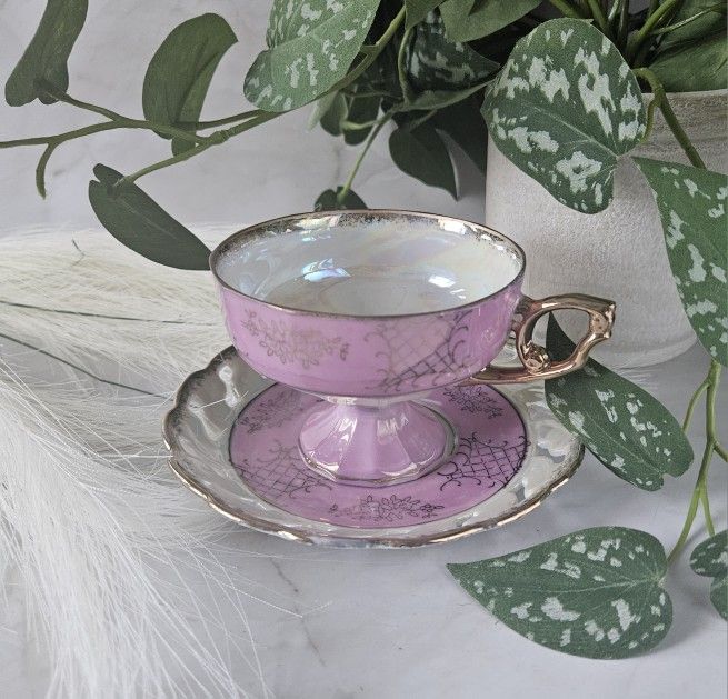 Vintage Lusterware Pedestal Teacup & Saucer Pink Gold tea party I believe the material is bone china but I am not certain there are a few imperfection