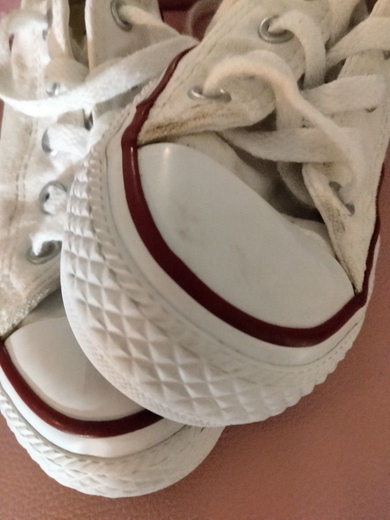 They Are White With The Red And Black Outline They Have A Little Bit Of Grip You Have To Tie The Shoe And The Brand Is Converse
