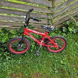 Red kids bike.