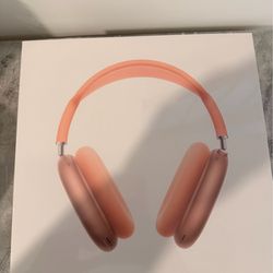 Coral colored AirPod maxes