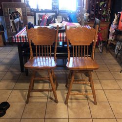 Two Vintage solid wood chairs