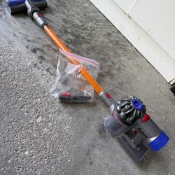 Dyson Battery Powered Kids Toy With Confetti that moves in device when trigger pulled. 