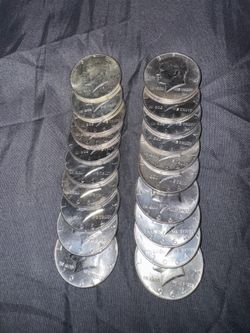 one roll of (20) 50 Cent coins 90% silver UNDER SPOT  VALUE