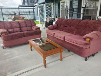 Pink sofa and loveseat