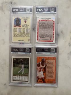 Four Michael Jordan cards,