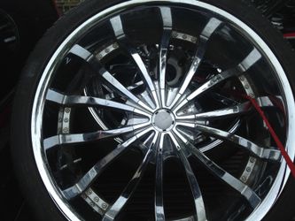 26 inch rims and tires(3 only) one tire needs to be replaced two are good. SIZE 305x30ZR 26. $229ONLY 3 WHEELS