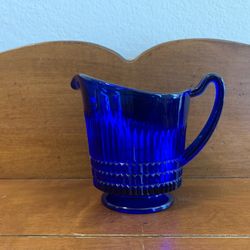 Vintage Cobalt Blue Glass Creamer about 3.75” tall x 4.75” long (with handle)