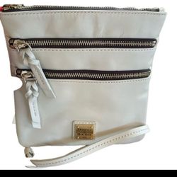 Elevate your fashion game with the luxurious and versatile Dooney & Bourke Triple Zip Leather Crossbody & Dustbag NWT. Crafted from high-quality, supp