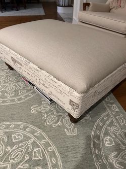 NEW-Upholstered Ottoman with Neutral Linen and French Script Print and beautiful turned wooden legs (purchased for $499)