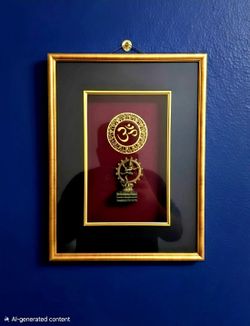 Traditional Indian religious wall hanging featuring two key Hindu symbols: a circular Om motif and a small brass Nataraja (Dancing Shiva) idol. 12"×18