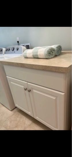 Four Hampton Bay Cabinets & Counter Top