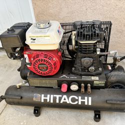 Hitachi 5.5 wheelbarrow type air compressor