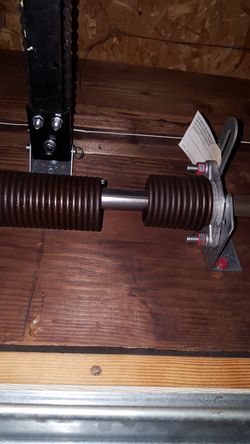 Broken garage door springs repaired