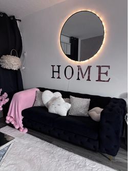 elegant and very clean black velvet sofa