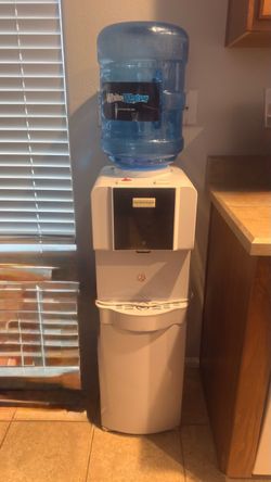 Water Cooler / Dispenser – $50 Selling a water cooler/dispenser