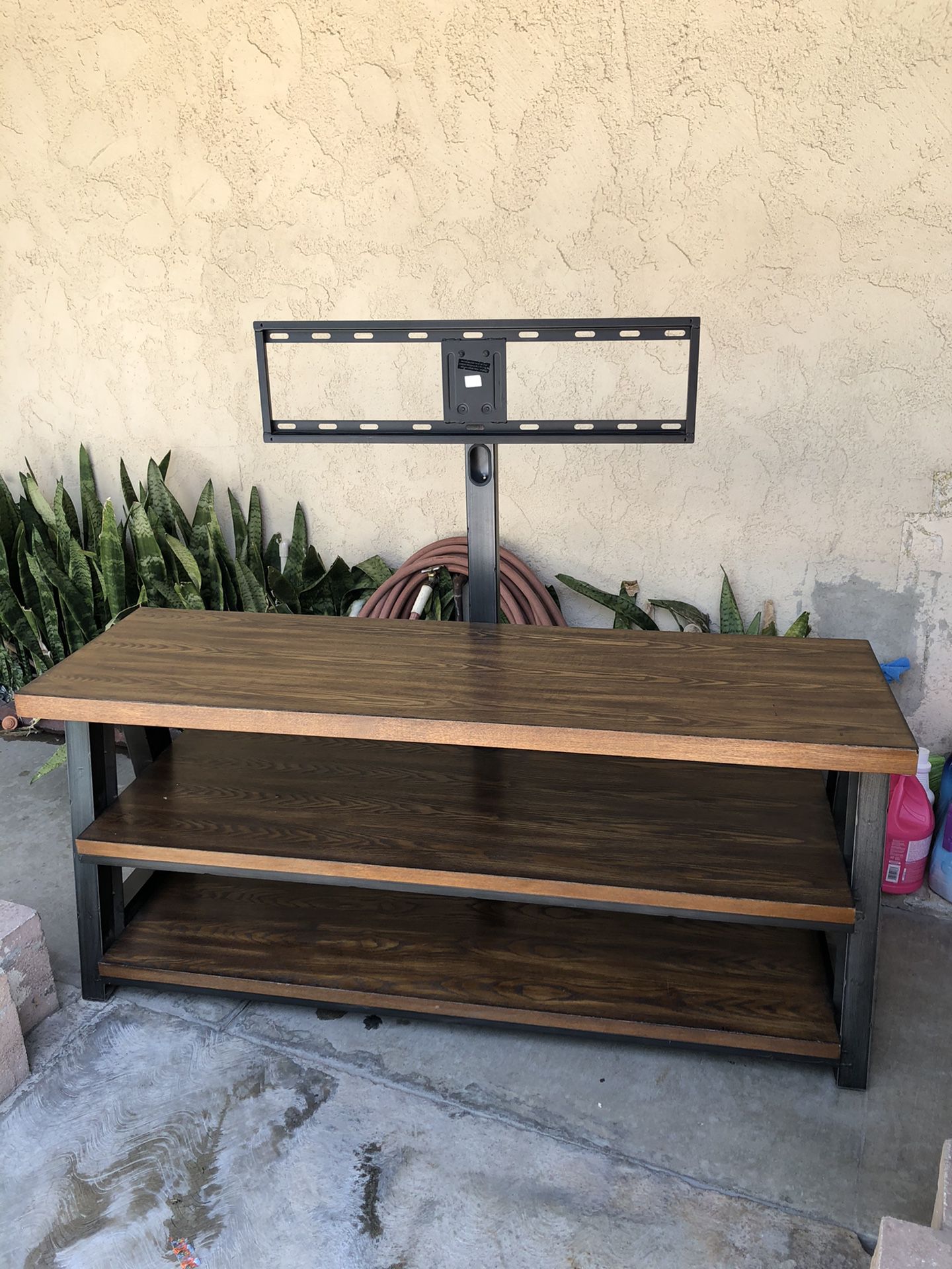 TV stand mount in good condition HMU