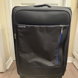Black American Tourister Luggage Bag With 4 Wheels