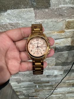 Michael Kors rose gold women’s watch