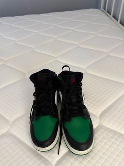Black, White, and Green Jordan’s Size 6.5y