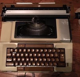 Electric type writer