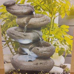 Indoor outdoor waterfall fountain, new in box . Stone