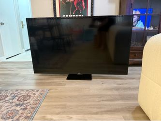 65 inch Samsung TV with stand