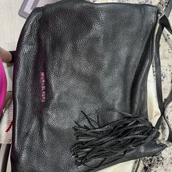 Like new Michael Kors, tassel crossover bag