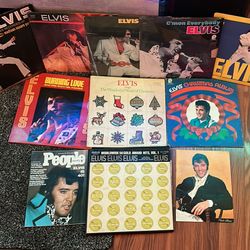 Elvis Vinyl collection of 9 sold as a set extremely fair price. Includes magazine and photo album