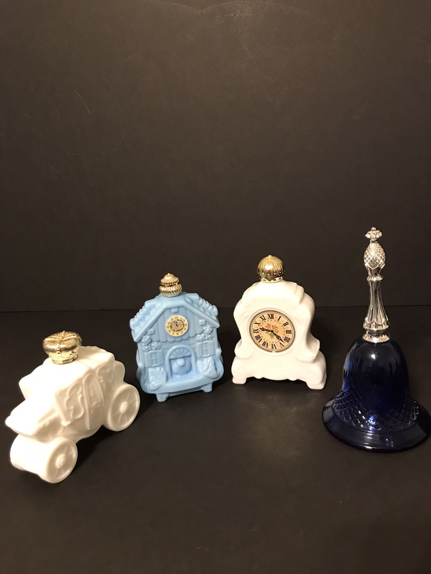 4 Vintage Avon Fairytale Bottles- 2 Large Clocks, 1 Stagecoach, 1 Blue Bell