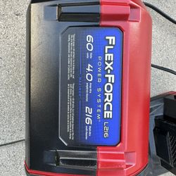 Toro recycler battery operated lawn mower and weed trimmer 