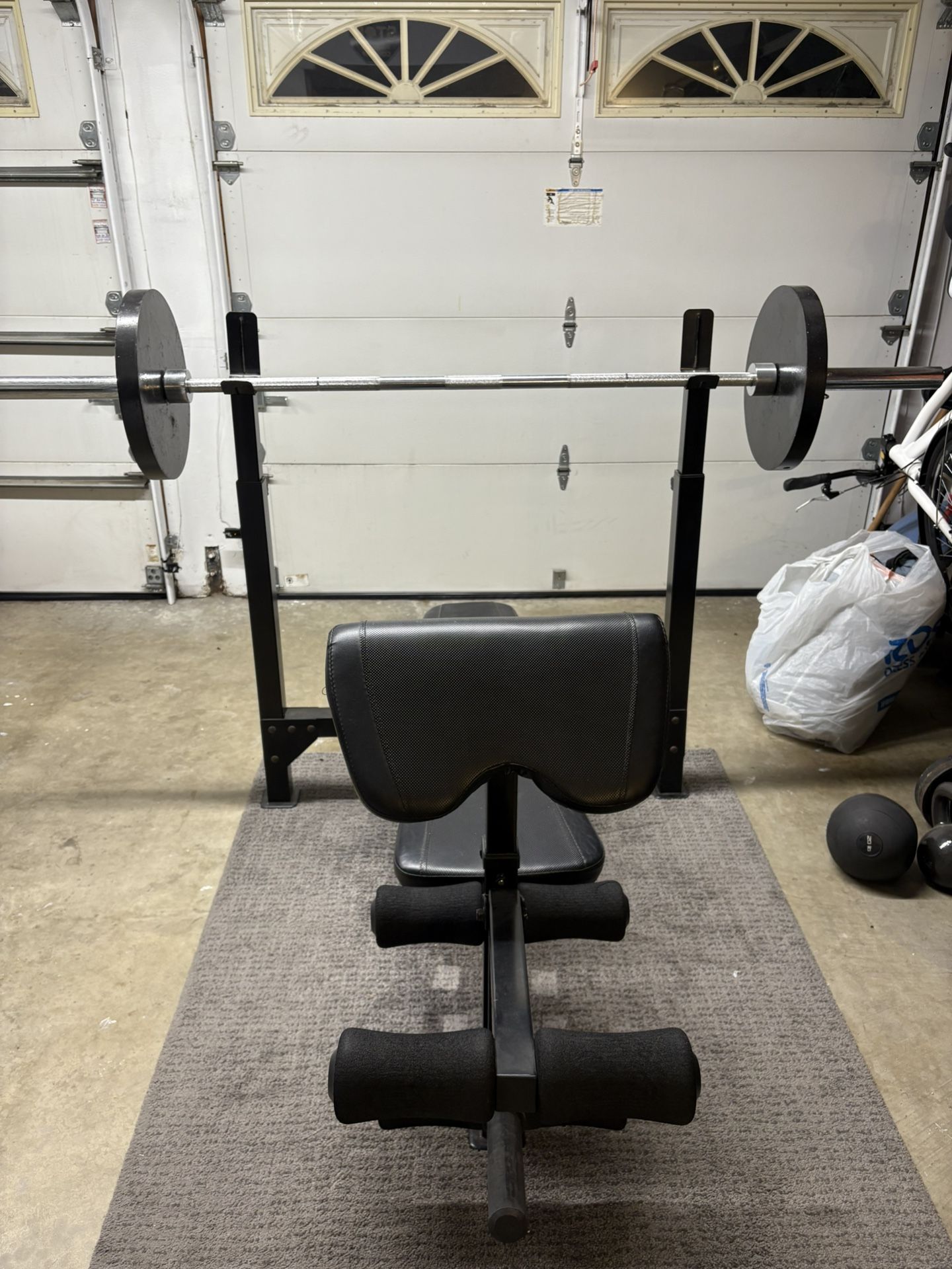 Bench Press With Olympic Bar And Weights 