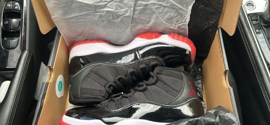 Air Jordan Bred 11s.