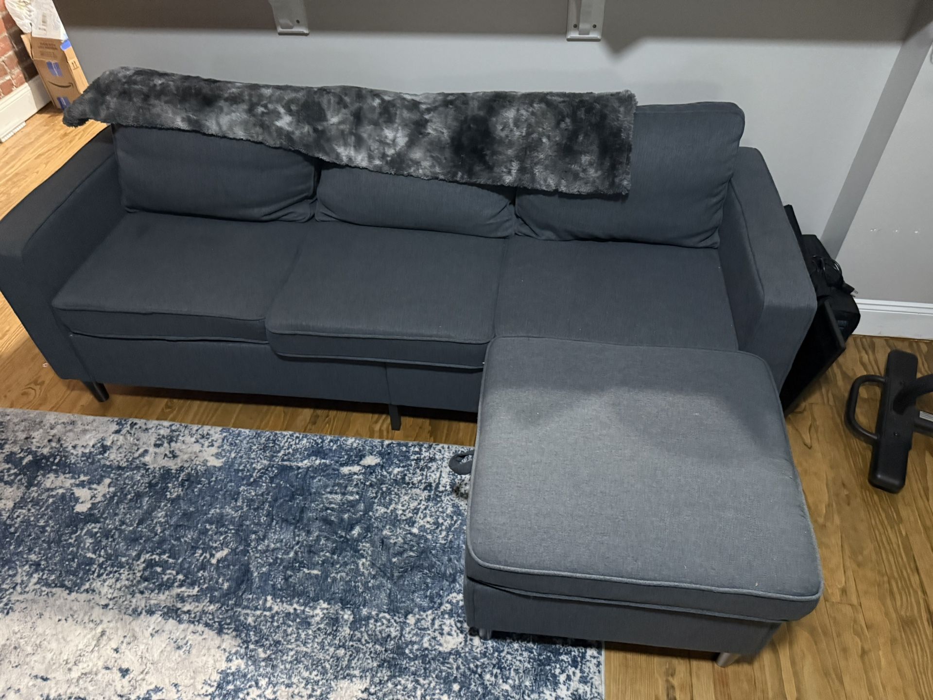 4 pcs Sectional Sofa with Storage ottoman.