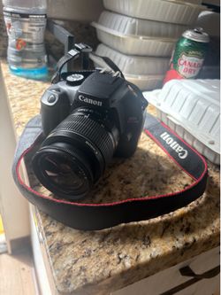 Canon EOS Rebel T100 Digital SLR Camera with 18-55mm Lens