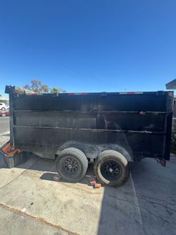 Dumper Trailer 12x6 With new battery and goes fully up and down.