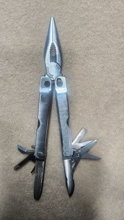 Vintage Leatherman w/case "looks unused"