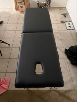 Massage table