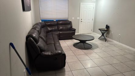 Leather recliner couches and center table