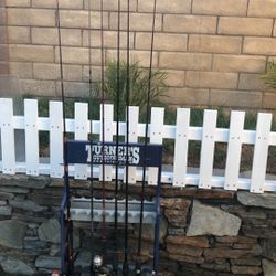 Six (6) Fishing Rods with Reels Plus a Turners Rod Rack.
