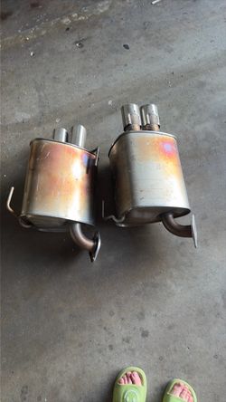 factory stock OEM rear mufflers a Subaru WRX generation such as the VA (2015–2021) or VB (2022+) chassis.