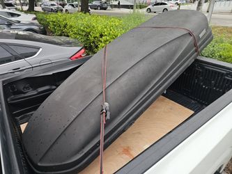 Thule Rooftop Cargo Box Black. Fair condition.