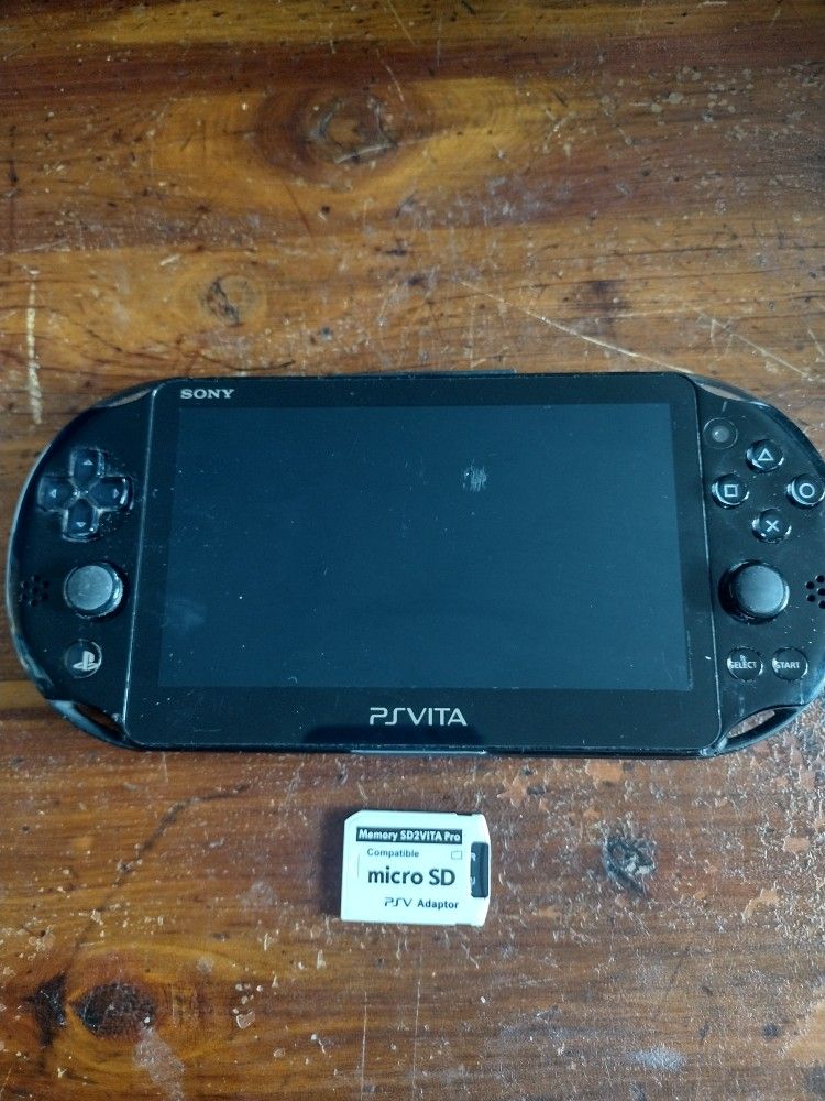 PlayStation Vita 2000 System With 32GB Memory Card And Games