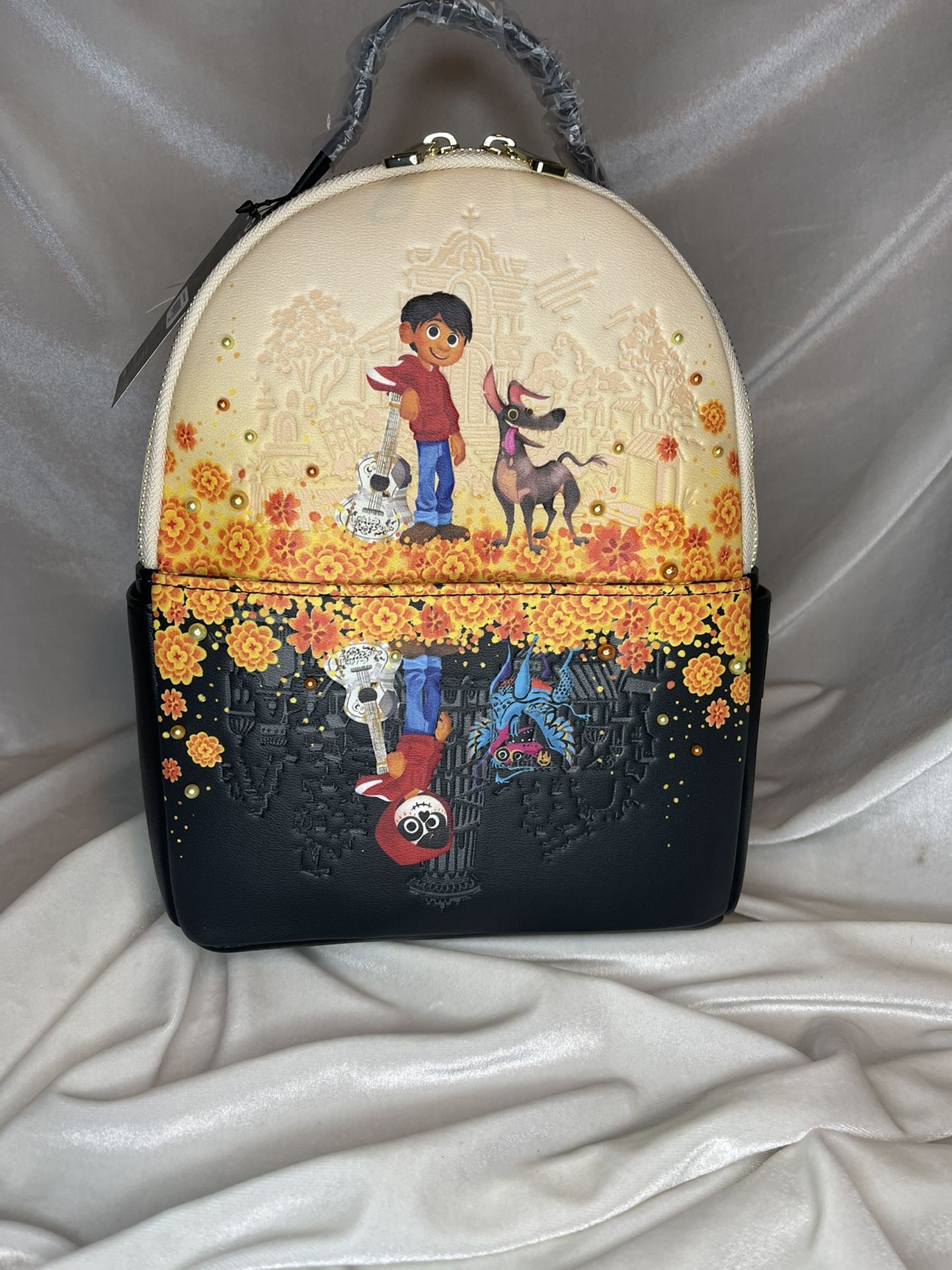Loungefly Mini Backpack Featuring Coco With Migel And Dante  