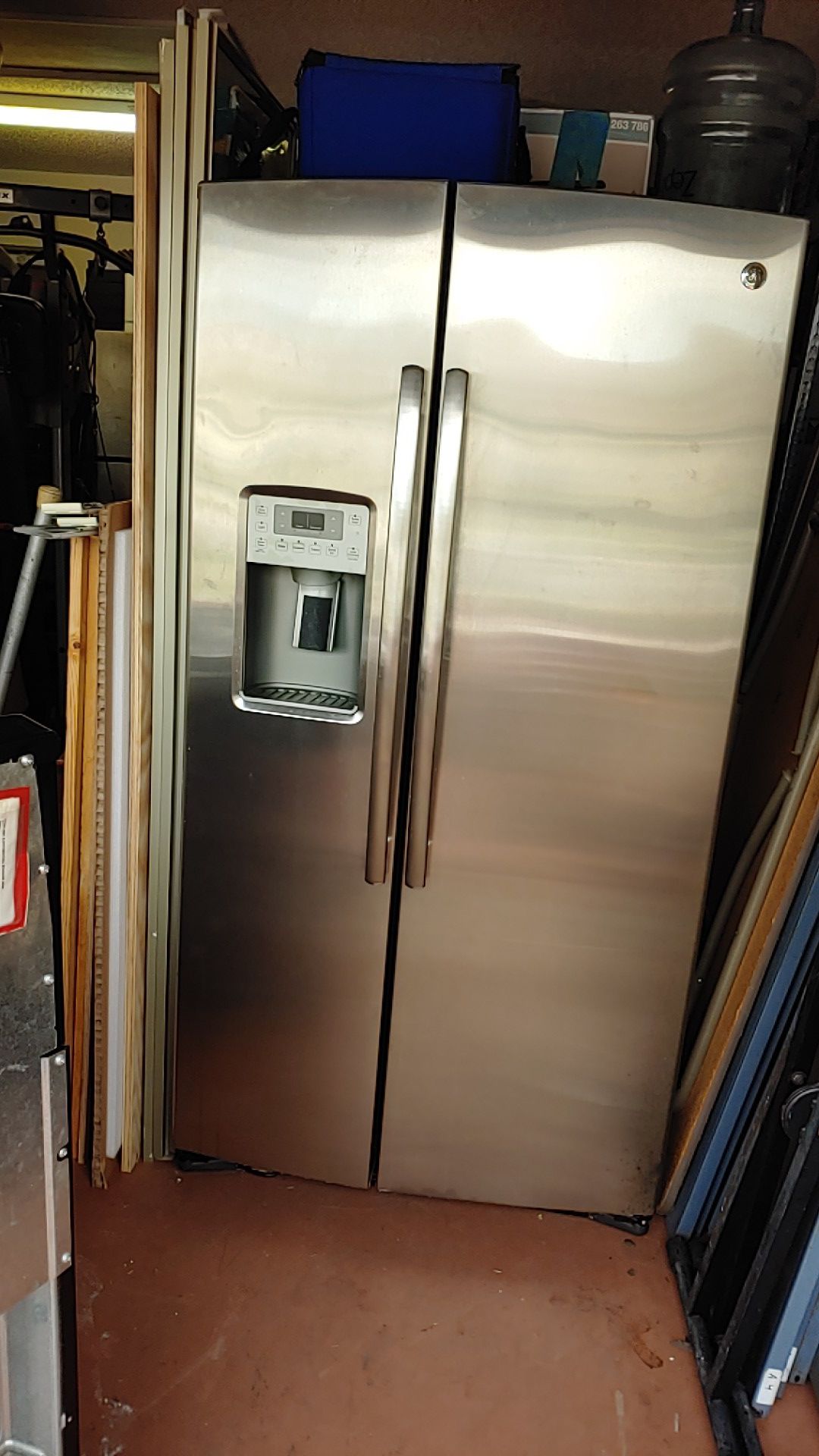 GE side-by-side refrigerator stainless steel front black on sides