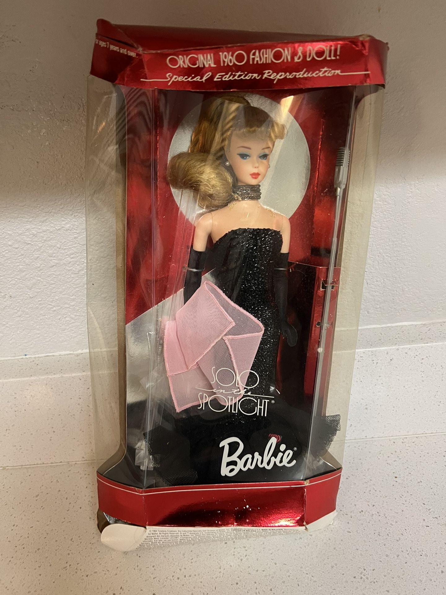 Solo In The Spotlight Special Edition Barbie Doll Reproduction from 1994 by Mattel. It is a reproduction of the original 1960 fashion and doll. The