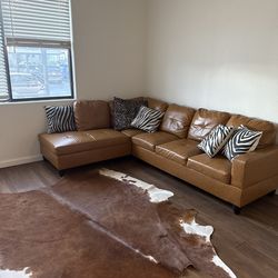 Faux leather sectional like new condition MUST PICK UO
